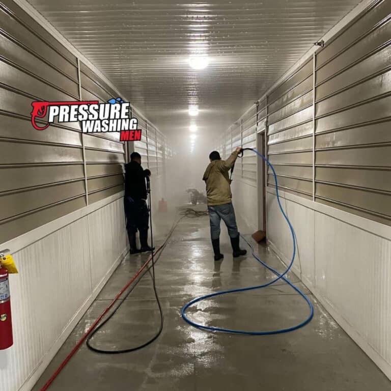 people cleaning indoor storage wall with soft washing service in johns creek georgia